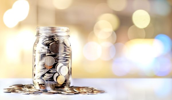 A picture of a jar full of coins