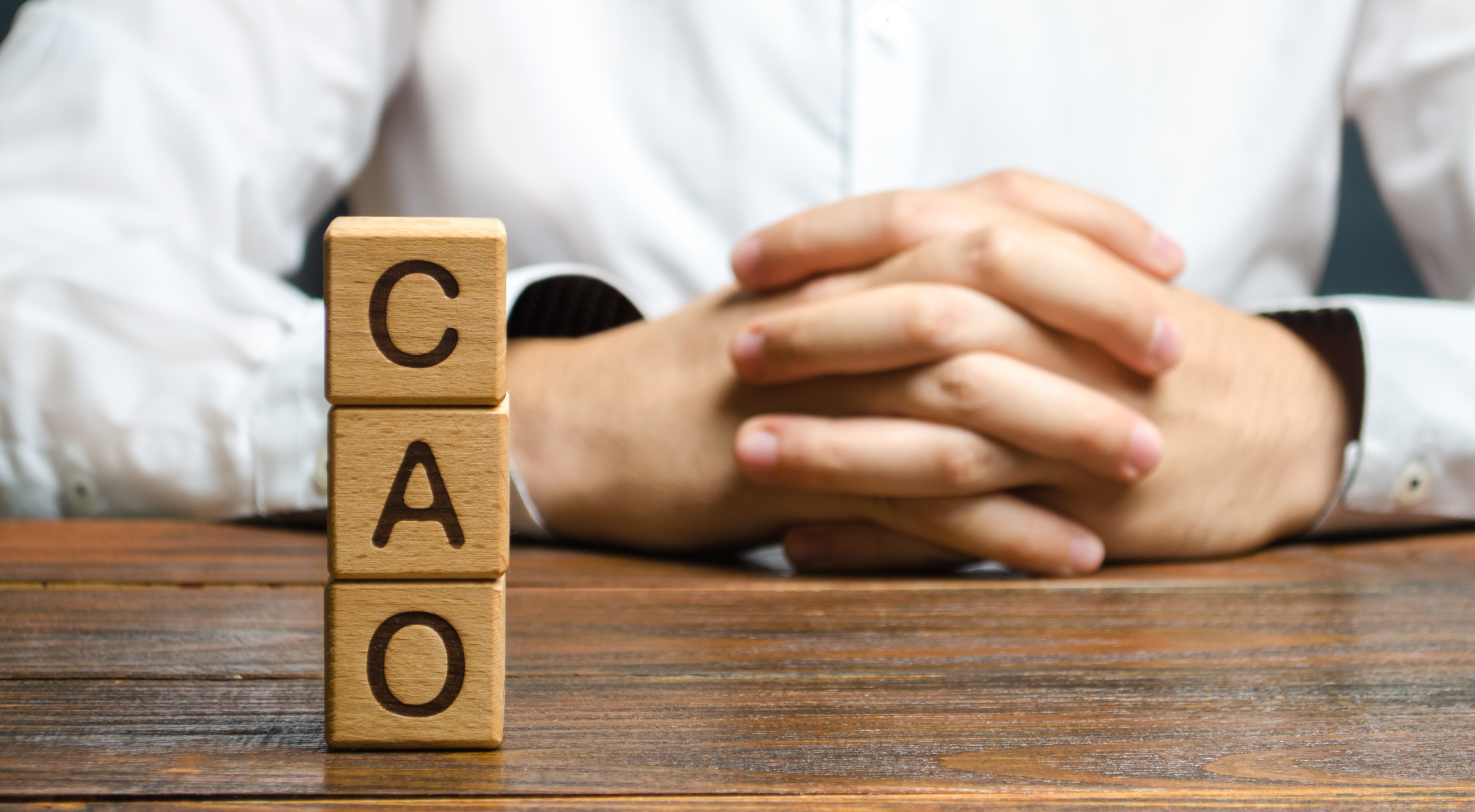 A picture of three blocks saying CAO