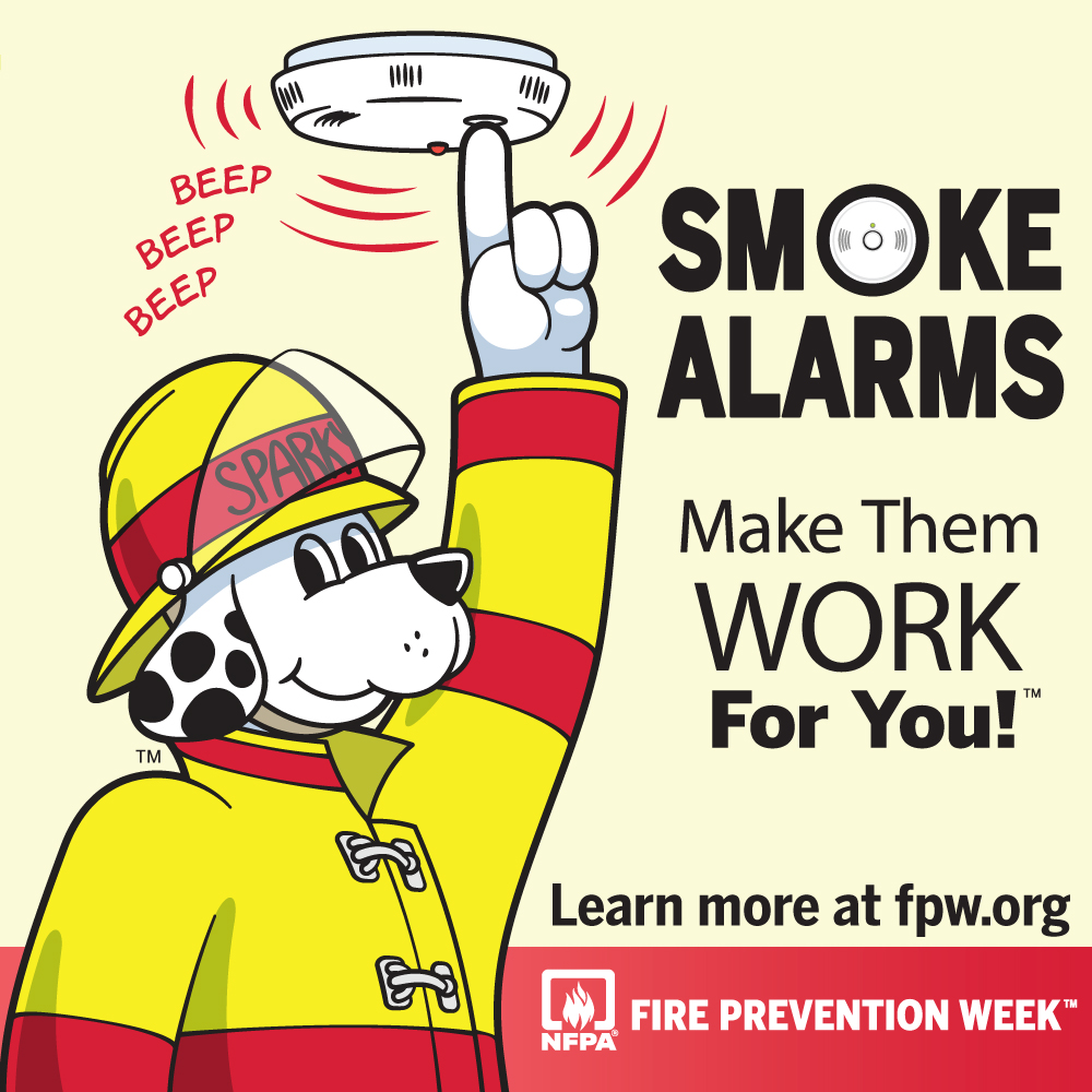 Fire Prevention mascot reminding the community to check their smoke alarms